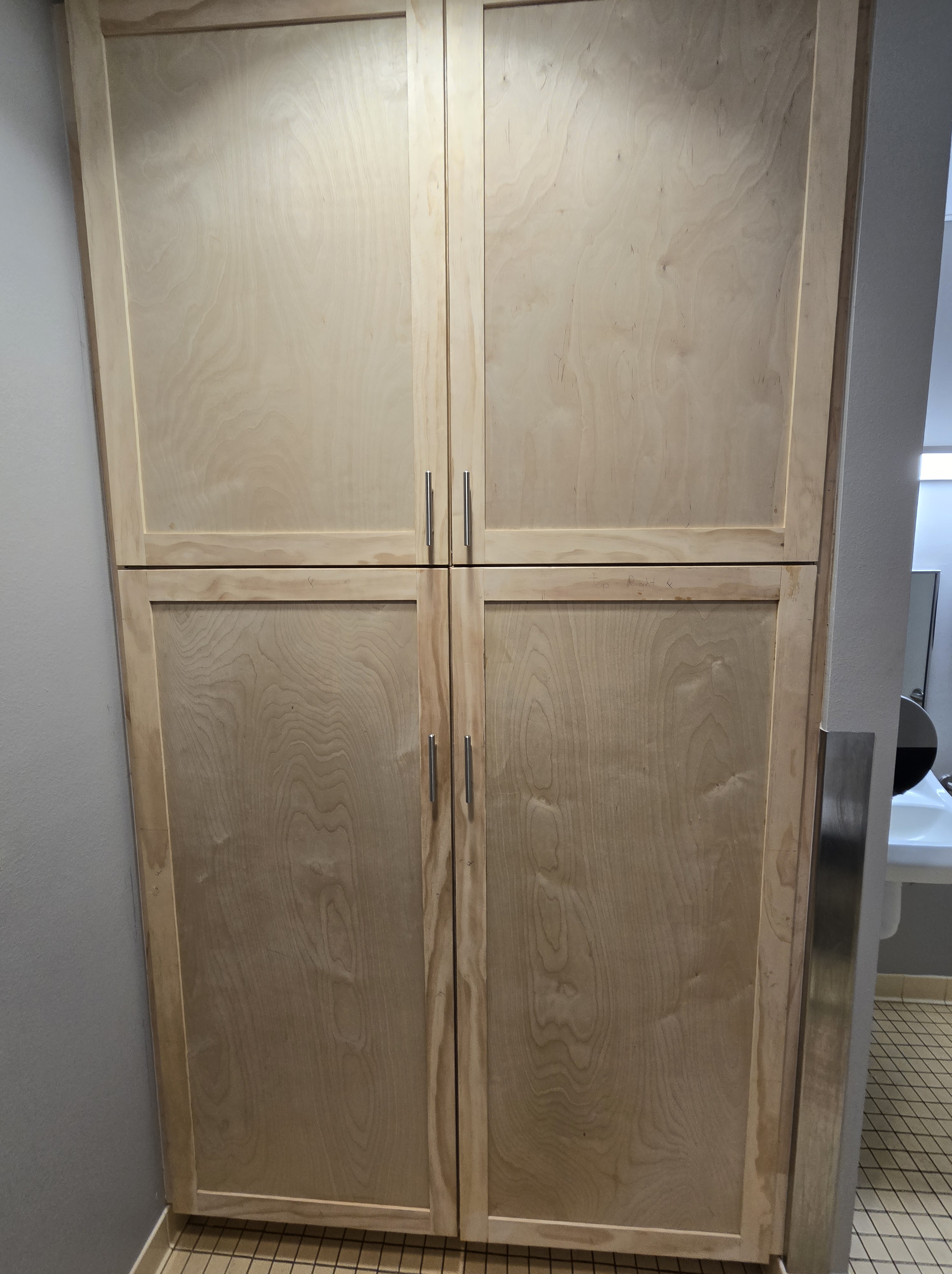 Volunteers of America One Stop Center Bathroom Cabinets – Build & Install